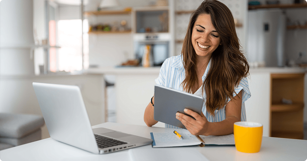 white female landlord reviewing a share tenant list in Canada